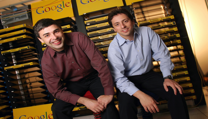 April 08, 2003: Larry Page (L), Co-Founder and President, Products and Sergey Brin, Co-Founder and President, Technology pose inside the server room at Google's campus headquarters in Mountain View. They founded the company in 1998. (Photo by Kim Kulish/Corbis via Getty Images)